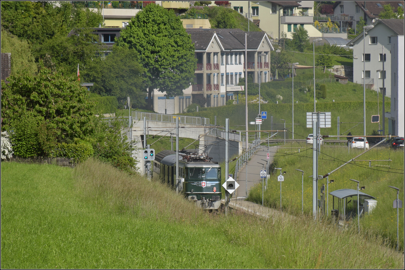 150 Jahre Emmentalbahn. 

In Wolhusen war der Zug dann doch zu schnell. So blieb ein nur noch Blick auf Ae 6/6 11407 'Aargau'. Mai 2025.