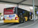 (255'976) - PostAuto Ostschweiz - SG 436'003/PID 10'499 - MAN am 7. Oktober 2023 beim Bahnhof Pfffikon