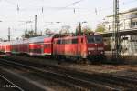 111 067-5 mit RE30042 nach Rosenheim am Heimeranplatz.