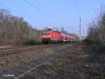 143 868-8 zieht den RE 18211 Cottbus durch Eisenhttenstadt.