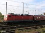 143 012-3 mit ein RB11 Cottbus und ein Fahrradbateilwagen im Zug beim verlassen von Eisenhttenstadt.