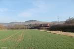 152 079-0 zieht ein Containerzug bei Himmelstadt.