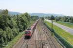 185 395-1 mit einem leeren Autotransportzug in Hemsbach in Richtung Darmstadt.