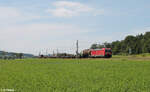 187 135 zieht mit einem gemischten Güterzug bei Oberdachstetten in Richtung Süden.