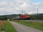 187 111 zieht bei Pölling ein Containerzug nach Regensburg 13.07.24