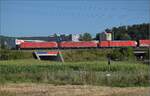 Dreifachtraktion 185 133, 185 114 und 185 119 bei Salina Raurica. August 2025.