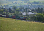193 474 'Mannheim' SBBCI mit Containern bei Frick, Juni 2025.