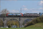 193 467 'Brig' und 193 540 'Atomium' von SBBCI mit einem Containerzug auf dem Eglisauer Viadukt über den Rhein. April 2026.