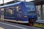 426 038 im Design der Bodensee-Oberschwaben-Bahn in Friedrichshafen.