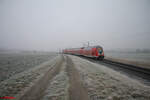 445 056 als RE55 RE4647 Frankfurt/Main - Bamberg bei Zeuzleben auf der Eingleisigen Strecke Gemünden - Schweinfurt. 28.12.24