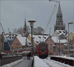 Erster Schnee des Winters.

Schwarzwaldbahn-Dosto hinter 146 238 auf der Rheinbrücke in Konstanz. November 2024.