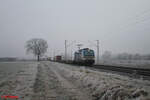 193 538 zieht ein Containerzug in Richtung Norden bei Retzbach - Zellingen. 28.12.24