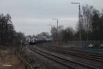 223 144 mit einem Kesselzug bei der Einfahrt in Wiesau.02.01.14