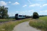 223 144 mit einem Kesselzug aus Cheb nach München bei Brand.