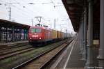 145-CL 013 (145 091-5) ex HGK 2003 ist jetzt wieder bei der OHE zu Hause und fhrt mit einem Containerzug durch den Bahnhof Stendal.