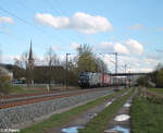 193 267-2  EDELSTAHL  zieht bei Thüngersheim einen Wechselpritschenzug gen Norden.28.03.24