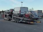 (156'595) - VW-Kfer auf einem Autotransporter am 17.