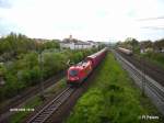 1116 022-3 durchfhrt Regensburg mit ein gedeckten Gterzug Railion.