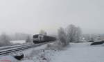 248 001 von Railsystem RP Vectron Dual Mode, angemietet für Testzwecke von der SETG, heute mit dem 1660T Hackschnitzelzug mit reine Ziegler Group Hackschnitzelcontainer kurz nach dem