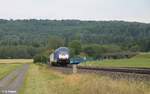 645 010 alias ER20-010 mit leer Holzzug nach Wiesau bei Oberteich.