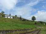 (211'453) - Kapelle mit herannahmendem TTA-Zug am 16.