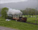 Vapeur Val-de-Travers: Train  Au fil de l'Areuse .

E 3/3 8511 umfhrt das Landhaus Le Marais zwischen Mtiers und Couvet. Mai 2023.