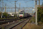 Re 486 501 und Re 475 410 in Pratteln. August 2026.