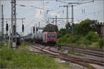 Re 482 026 mit leicht geändertem Outfit in Weinheim. Juli 2024.