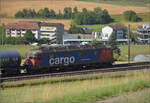 Re 6/6 11660 'Tavannes' mit Kesselwagen bei Frick, Juni 2025.