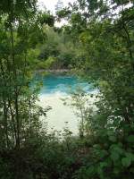(135'975) - Die Zulg (braun) und die Aare (blau) fliessen am 18.