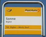 (195'538) - PostAuto-Haltestellenschild - Biglen, Sonne - am 5.