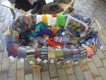 (210'492) - Handgestrickte Socken und Mtzen am 23.