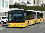 (245'950) - PostAuto Nordschweiz - BL 196'034/PID 5348 - Mercedes am 7. Februar 2023 beim Bahnhof Locarno