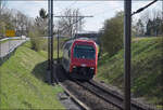 Re 450 002 mit einer S-Bahn Zürich bei Lottstetten. April 2026.