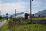 RABe 512 026 'IR Team Dosto' und RABe 512 030 'Serviceanlage Basel' bei Altreu. September 2026. 