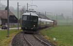 Im Stile des Orientexpress. 

Mit Re 4/4 10039 und Re 4/4 I 10009 am Zugschluss. Waltrigen, November 2022.