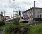 RABe 521 020 und RABe 523 038 nach Luzern in Emmenbrücke.