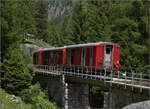 Zug nach Gletsch mit HGm 4/4 62 bei St.