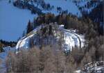 Auf der Alp Grüm.

Der ehemalige Motrice quaranta ABe 4/4 48, heute als Xe 4/4 23201 unterwegs, kann weiter Richtung Cavaglia fahren. Januar 2023.