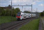 Testzug RABe 512 002 in Erlen. April 2024.