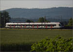 RABe 521 013 'Delémont' bei Hendschiken, Juni 2025.