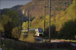 RABe 528 135 in Delémont auf dem Weg nach Basel.