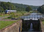 62-8/740167/am-rhein-rhone-kanaldie-rueckseite-des-gleichen-zuges Am Rhein-Rhone-Kanal.

Die Rückseite des gleichen Zuges Z 27859 aus Mülhausen Richtung Belfort. Juli 2021.